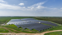 large photovoltaic open space plant under blue sky
