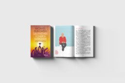 Buchcover und aufgeschlagenes Buch
